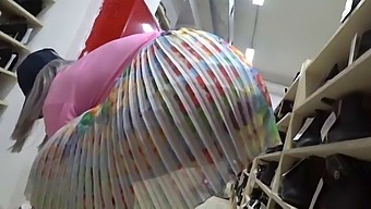 A Voyeur With A Hidden Camera In A Public Place Watches Juicy Booty. Foot Fetish And Peeping Under A Skirt In A Shoe Store.